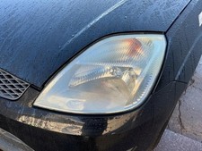 Phare principal gauche Ford