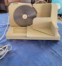 ANCIENNE TRANCHEUSE ELECTRIQUE