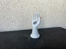 Main porte-bagues en