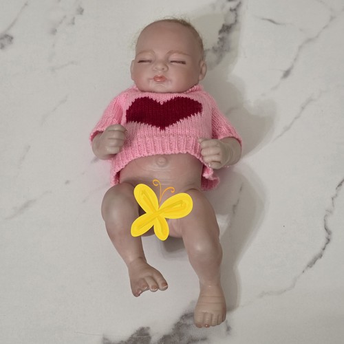Reborn baby doll painted - 11",
