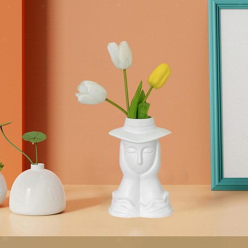Vase forme visage - en, de