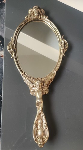 Miroir face main - face, À