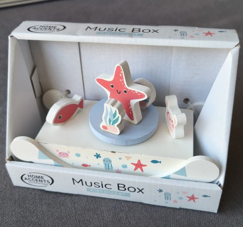 Boîte musique carrousel - À,