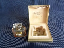 ancien flacon de parfum JOY de Jean Patou Paris avec sa boite d'origine