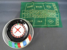 Ancienne petite boite de jeu roulette jetons et tapis portable jeux olympiques