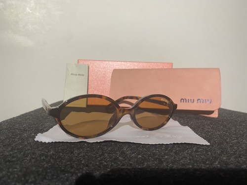 Lunettes soleil miu - de,