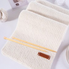 1 paire d'aiguilles à tricot