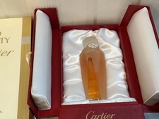 Parfum So Pretty de Cartier flacon cristal numéroté perles aux 3 ors 18 carats.