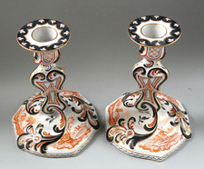 Paire bougeoirs faïence Saint