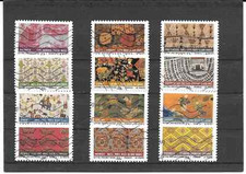 FRANCE 2011.TISSUS DU MONDE.SERIE COMPLETE DE 12 TIMBRES AUTOADHESIFS OBLITERE