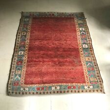 tapis d'orient  model petit motif couleur dominante rouge . XX siècle .