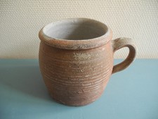 old varnished sandstone pot
