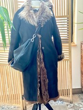 Manteau long en peau