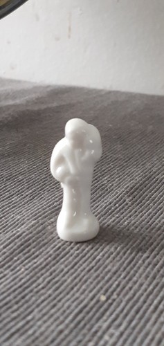 Fève personnage porcelaine