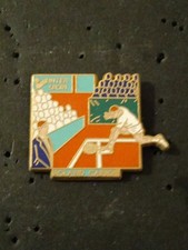 Pin's Roland Garros Arthus Bertrand Intersport 