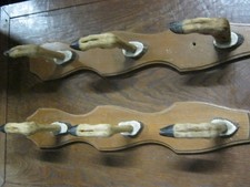 Paire porte-fusils pattes de