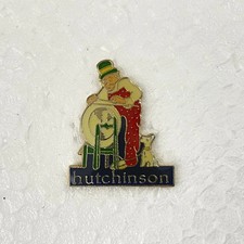 Pin's Hutchinson Meuleur avec Chien