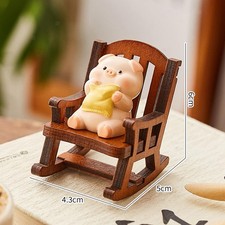 Chaise à Bascule, Figurine de