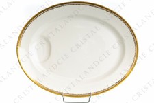 Plat ovale incrustations or par Théodore Haviland. Oval dish gold inlays