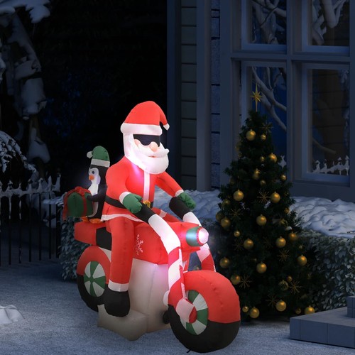 Père noël gonflable sur moto - sur,