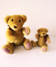 2 OURS en peluche ANCIENS   H: 22 et 14  cm .