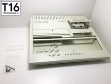 THOMSON MO6 - Coque complète avec vis et vitre de la trappe du lecteur cassette