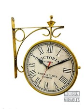 Horloge murale de gare double