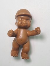 Figurine BABIES magic babies IDEAL 5cm El Greco Couleur brun CH051