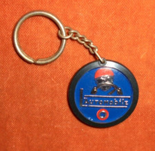 Porte-clés Key ring L'automobile pilote de course stylisée ( signé  QUILLERY )