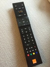 Télécommande orange  noire - fonctionne bien  ***comme neuve***