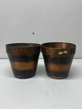 2 cache pot en cuivre réaliser à la main sûrement de l’artisanat quelque bosse