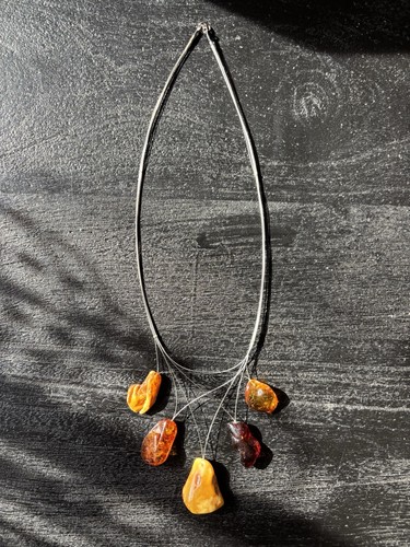 Five sculptural amber chunks - sculptural,