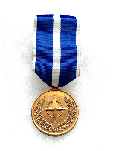 Une médaille kosovo - médaille,