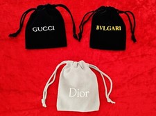 Ensemble de 3 pochons en velours ( Bulgari , Gucci , Dior )