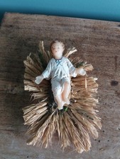 Santon crèche Devineau Jésus 7 cm en cire sur lit de paille et mousse taille 5 ?