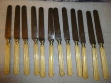 12 ANCIENS COUTEAUX A DESSERT FROMAGE ACIER FONDU VIROLE ARGENT MANCHE OS