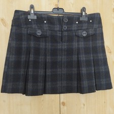 JUPE COURTE DOUBLEE A PLIS