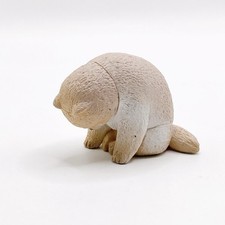 Mini figurine chiot fatigué