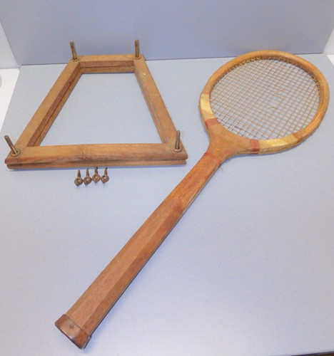 Raquette tennis dans sa - de,