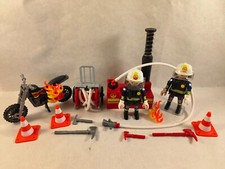 sympa Pompiers avec lance à