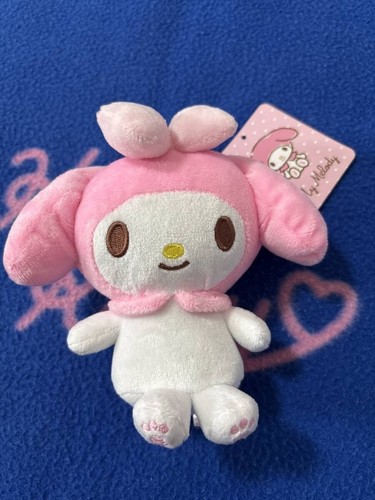 Pochette mascotte peluche - en,