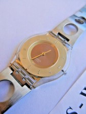 SWATCH Skin SFK240G Tri-Gold