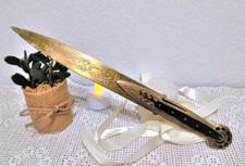 Coupe-papier en laiton à double lame