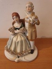 Figurines couple de musiciens en porcelaine fine