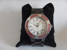 TOP ÉTAT KAPORAL 5 ATM BRACELET NOIR HIGH TECH CÉRAMIC LUNETTE STRASS ROUGE