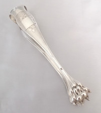 Pince à sucre en métal argenté patte de lion dans sa boite d'origine