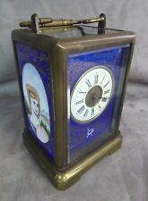 SUPERBE PENDULETTE D'OFFICIER, à décor plaques de porcelaine peintes.
