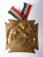 Pendentif médaille signé