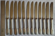 Jean COUZON : 12 couteaux vintage en acier inoxydable / Inox - Modèle à godrons