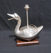 Lampe vintage représentant un canard en métal sur base en bois